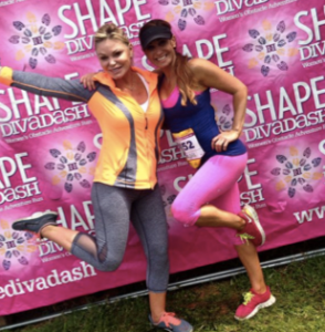 Me and Tamilee Webb in front of the Shape Diva Dash sign